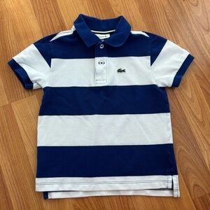 Lacoste boys navy and white bold striped polo